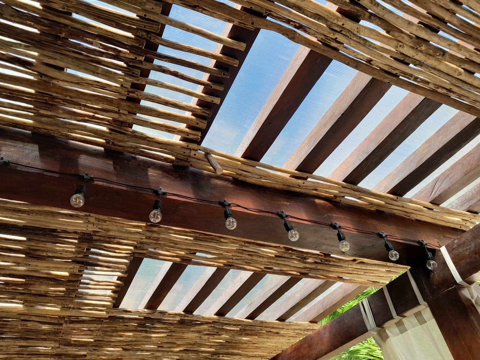 Olio full outdoor venue — natural wood pergola and dining environment, Paradisus Playa del Carmen